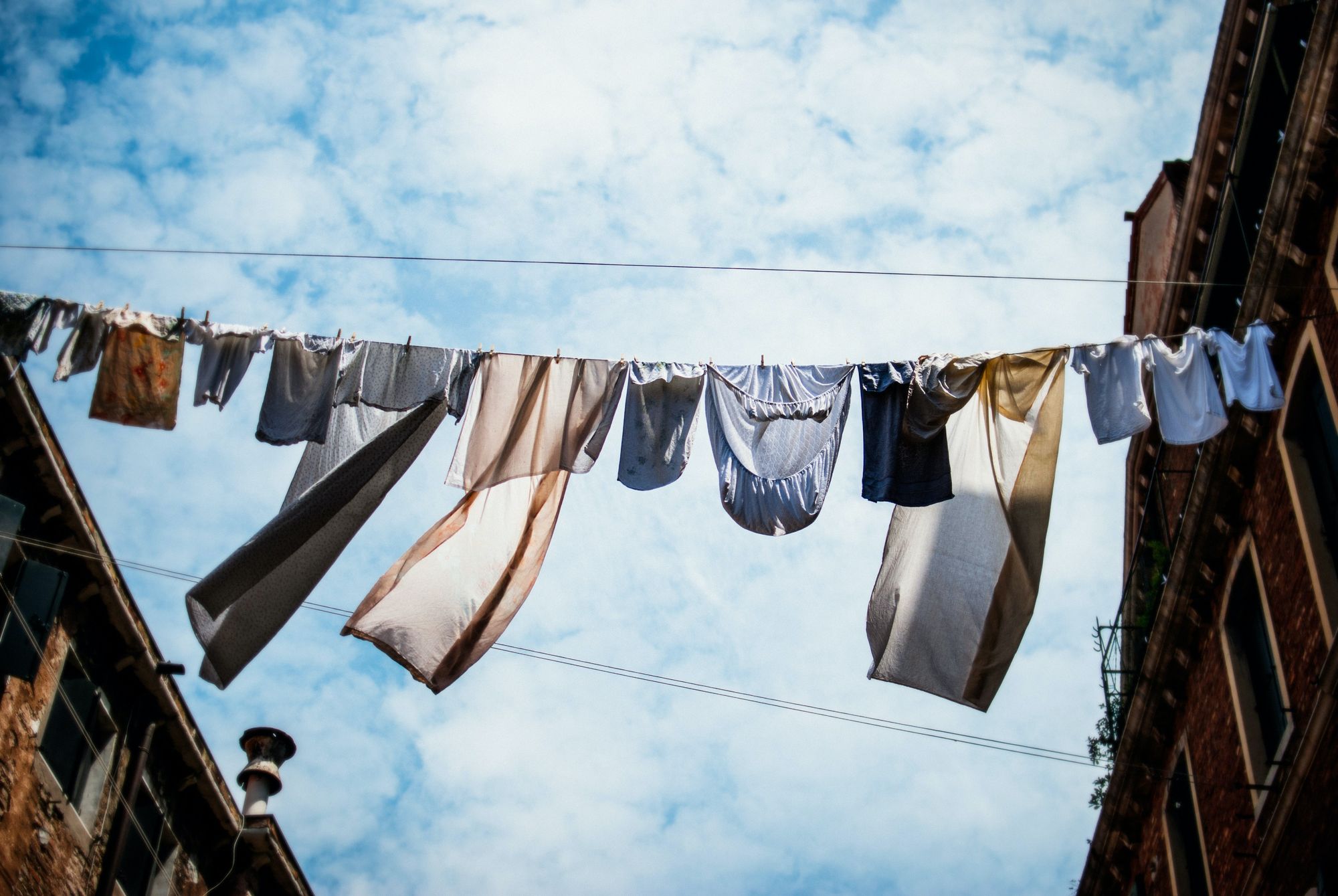 clothes in line being aired under the sun outdoors