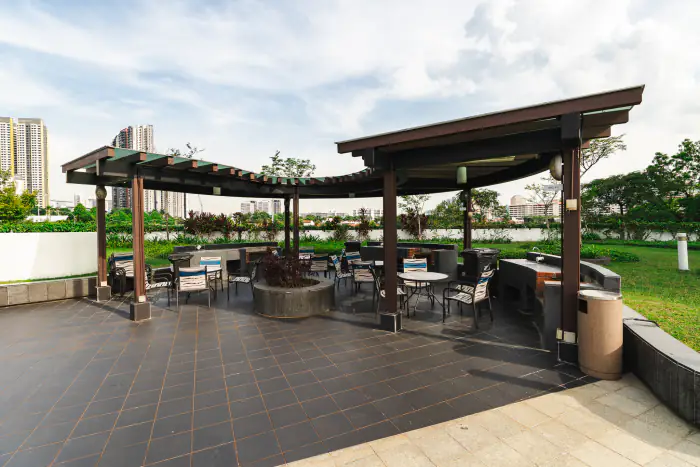 BBQ pavilion with outdoor dining on a garden deck at Parc Condo
