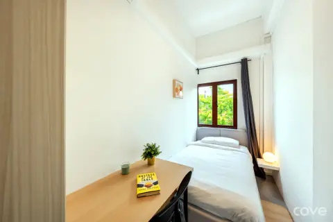 Pocket room with a single bed and a desk on Balestier Road