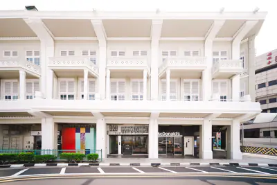 White facade of The White House serviced residences in Bugis