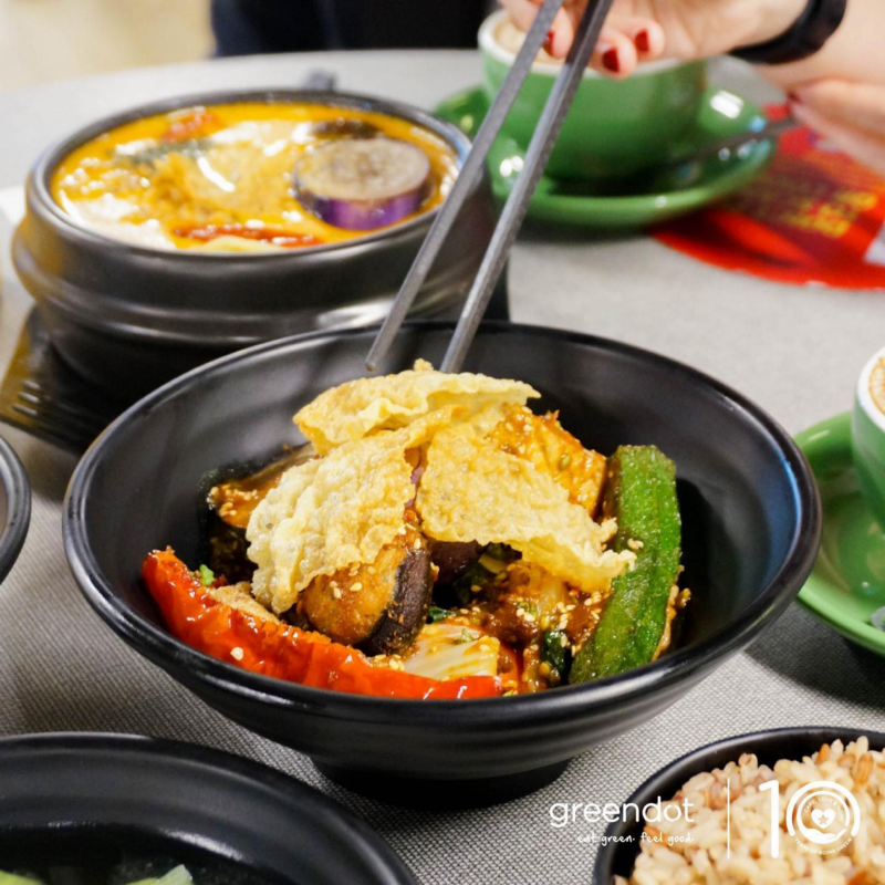 vegetarian Singaporean dish, topped with okra or lady fingers and chips